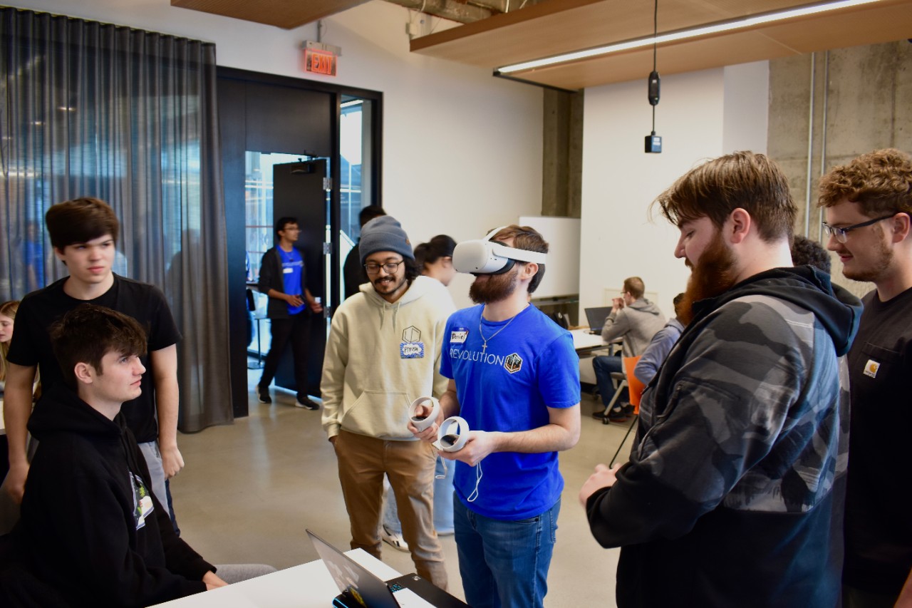 Students from last year's RevUC Hackathon.