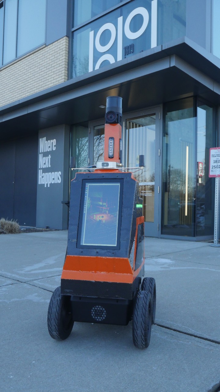 Airtrek robot in front of the UC 1819 Innovation Hub