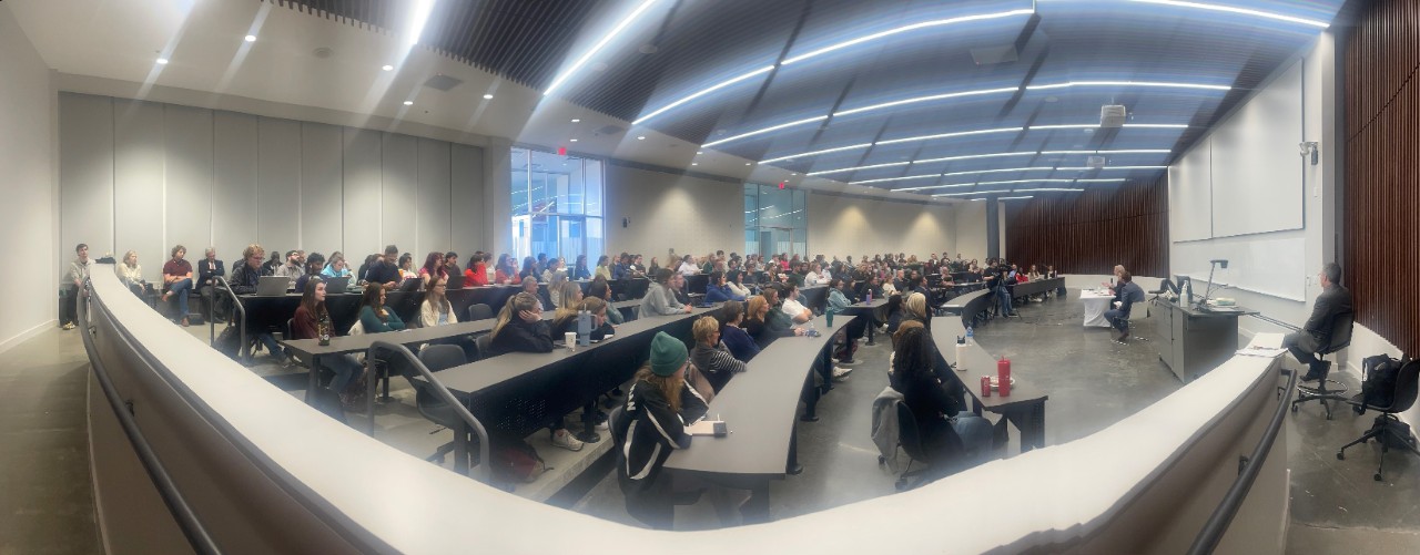 students at an auditorium 