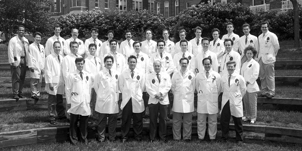 Group of people wearing white doctor coats