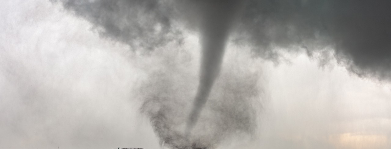 funnel cloud in the sky in black and white