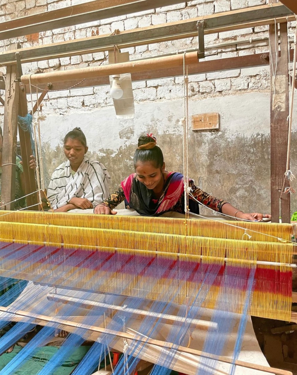 Capturing the student point of view as they witnessing the artistry of handloom weaving.