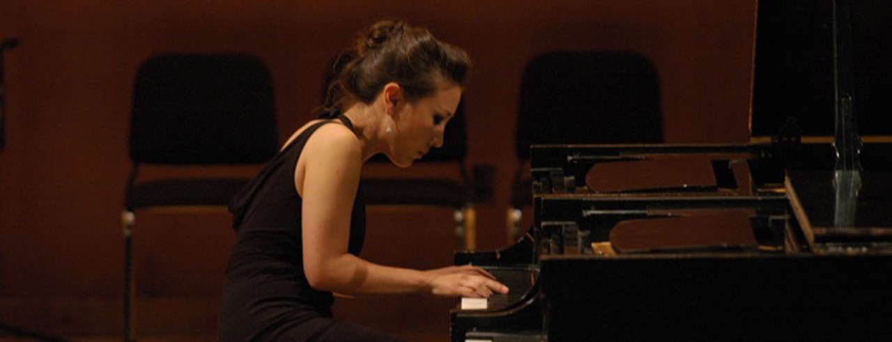 A photograph of new CCM faculty member Lynn Worcester Jones playing the piano. Photo/provided
