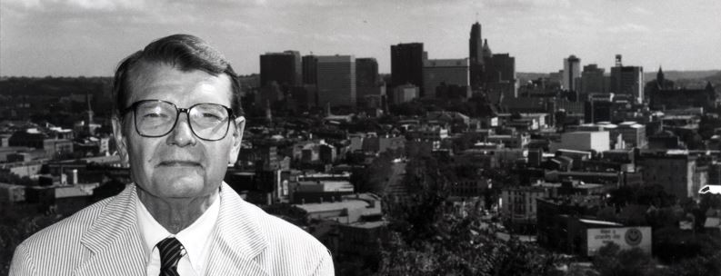 Zane Miller in front of Cincinnati skyline.