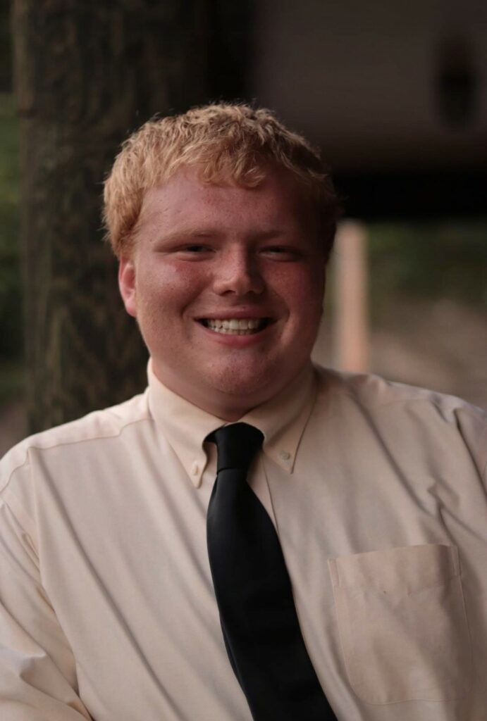 A headshot of Micah Roberts