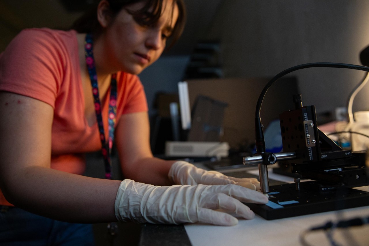 UC chemistry Assistant Professor Pietro Strobbia is using chemistry to study viruses in plants. Graduate student Niloufar Yavari works in his lab.