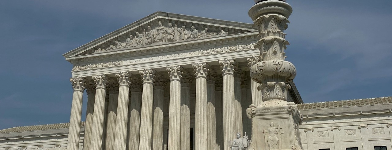 imposing Greek Revival building with 8 columns