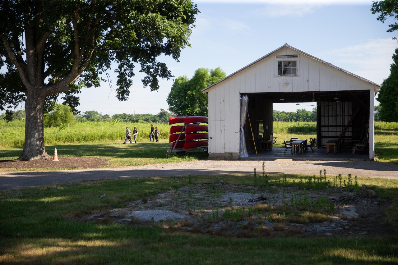 UC biologist and ornithologist Ron Canterbury at the Center for Field Studies with helpers banding birds for research.