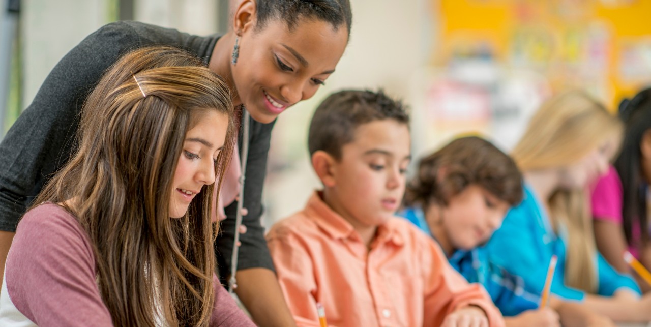 teacher with middle school children