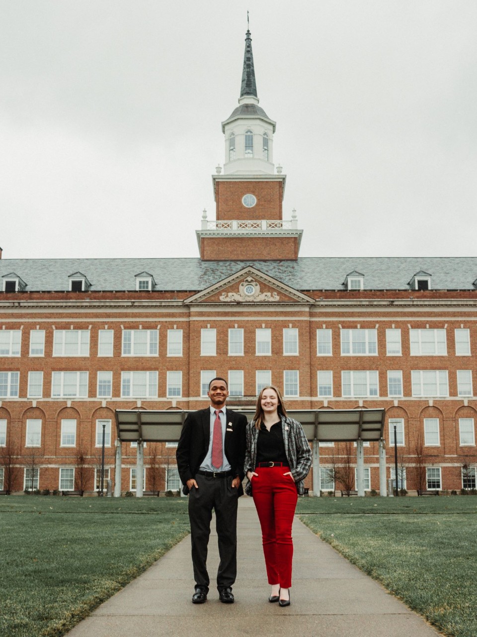 madison welsey and khalid davis standing on the uc campus