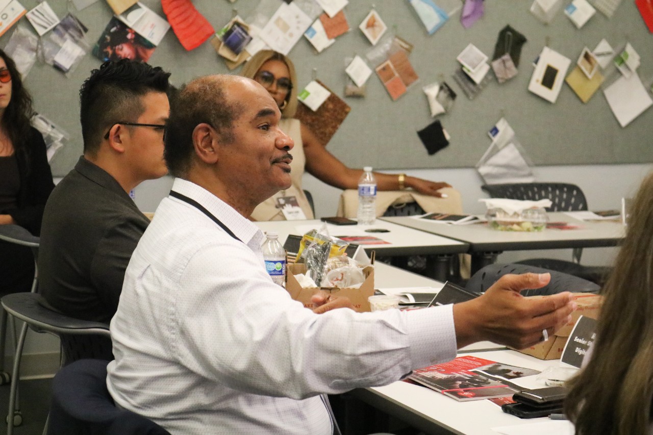 Rob Gordon sitting at the "Creativity and AI" workshop