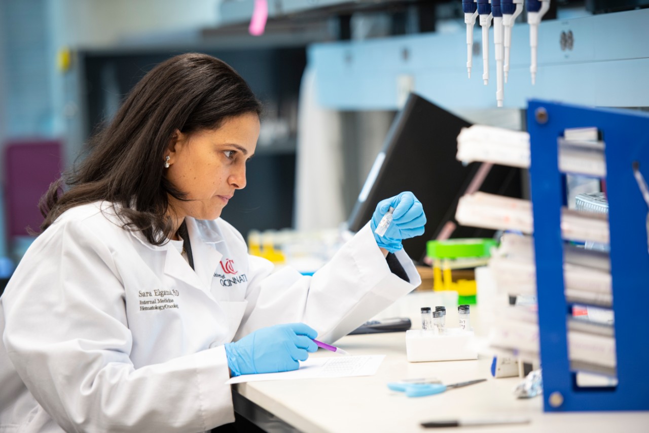 John C. Byrd, MD, in lab with his research team.