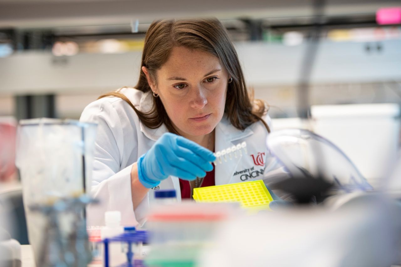 Erin Hertlein works in the lab