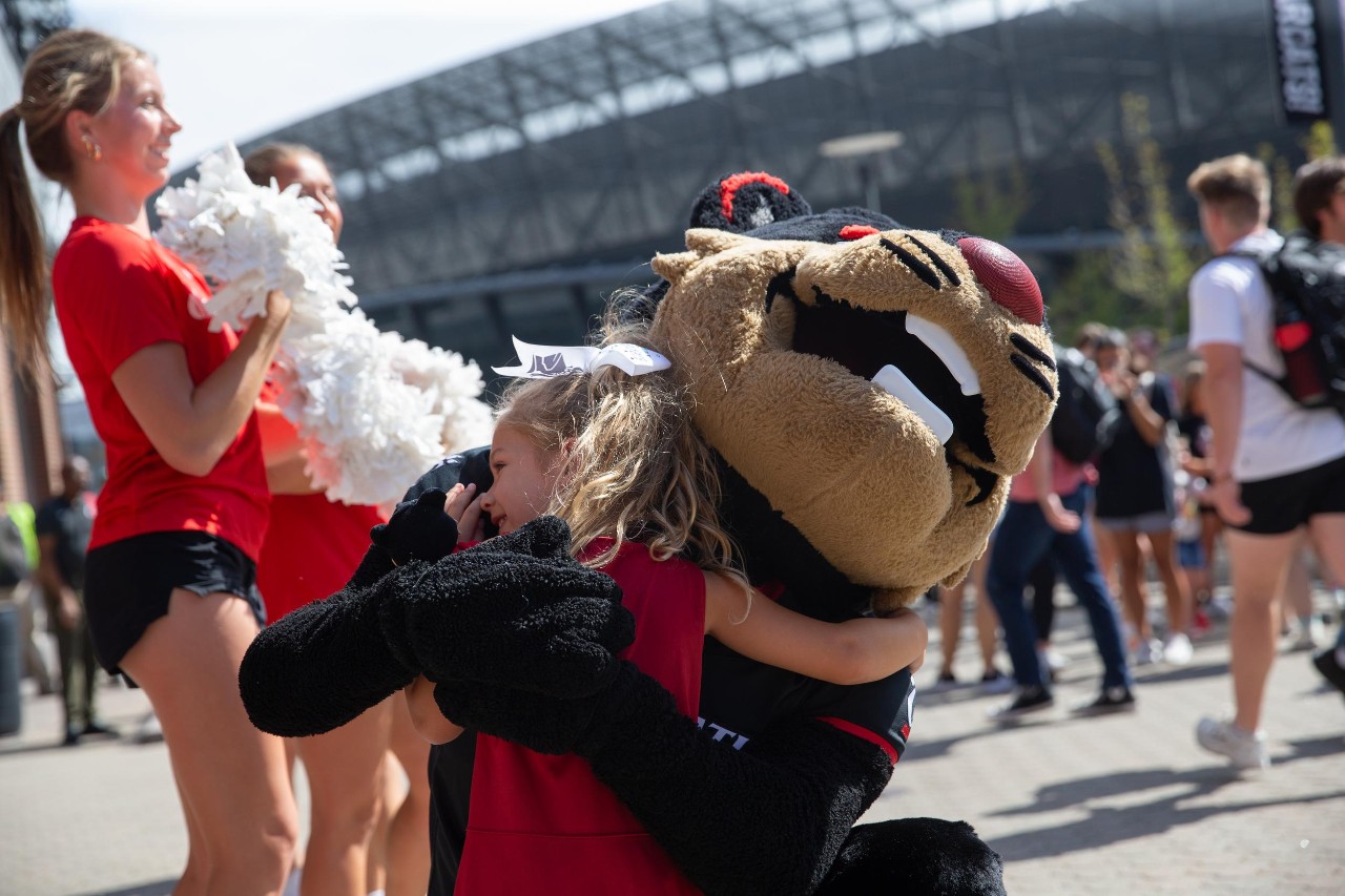 A pep rally on Mainstreet prior to UC's football game is part of Family Weekend events.
