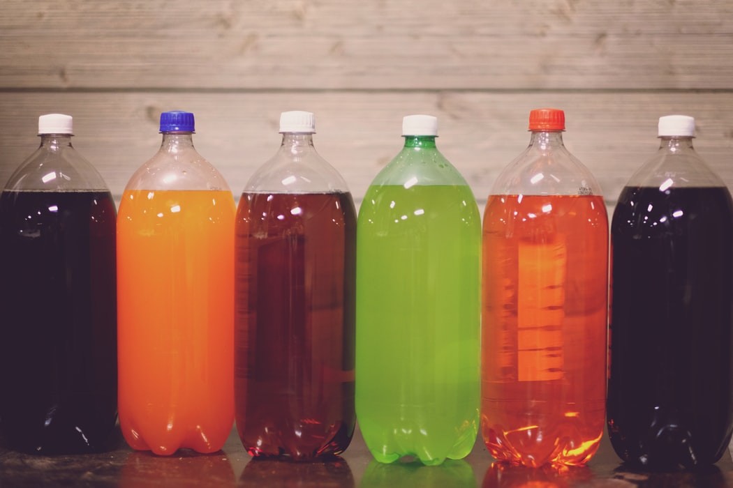 plastic bottles filled with soda