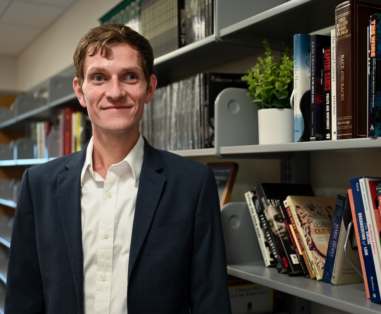 Ryan Thoreson shown in his office at UC Law
