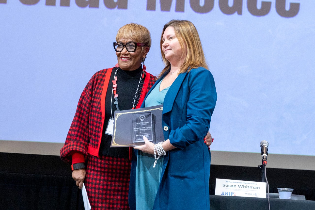 Brenda McGee receives the Outstanding STEM Educator Career Achievement Award at the STEM+ Conference 2024.