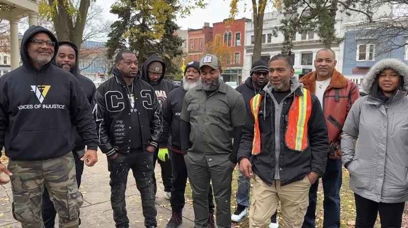 Al Cleveland, at left in the black sweatshirt, with other supporters who attended last week's rally in Elyria.