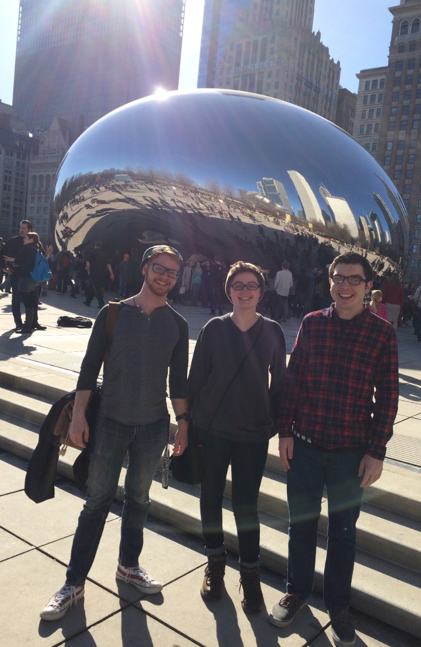 UC alum Benjamin hunt standing in front of a sculpture in Chicago