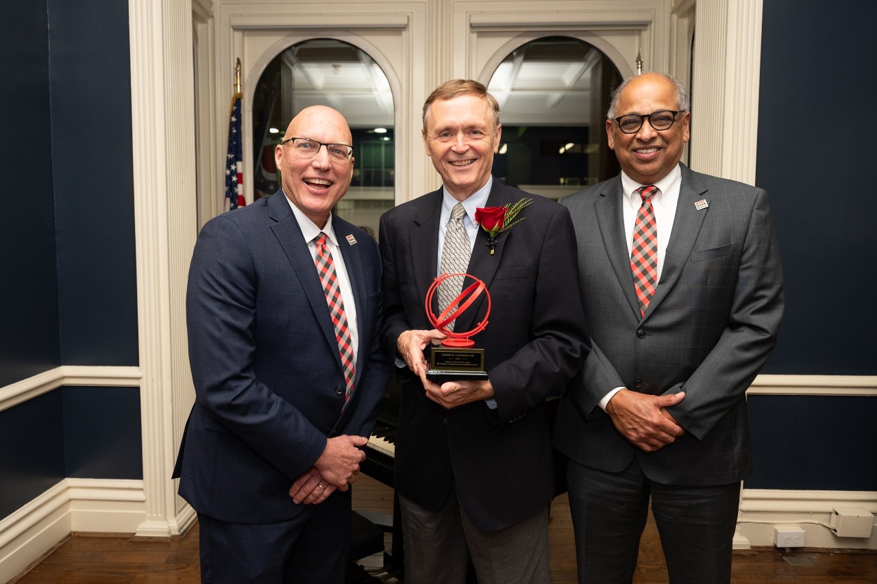 Jim Cashman poses with CEAS Dean John Weidner and UC President Neville Pinto