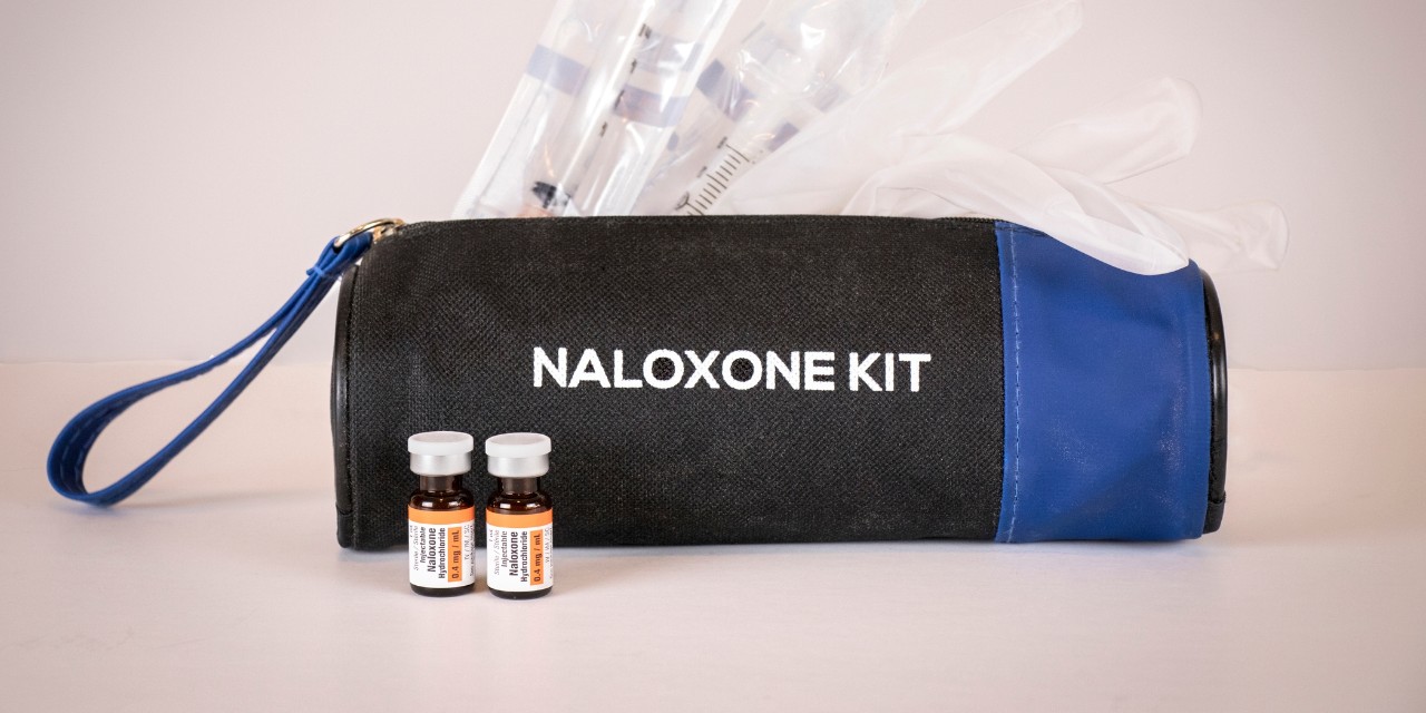 small pouch with narcan and needles 