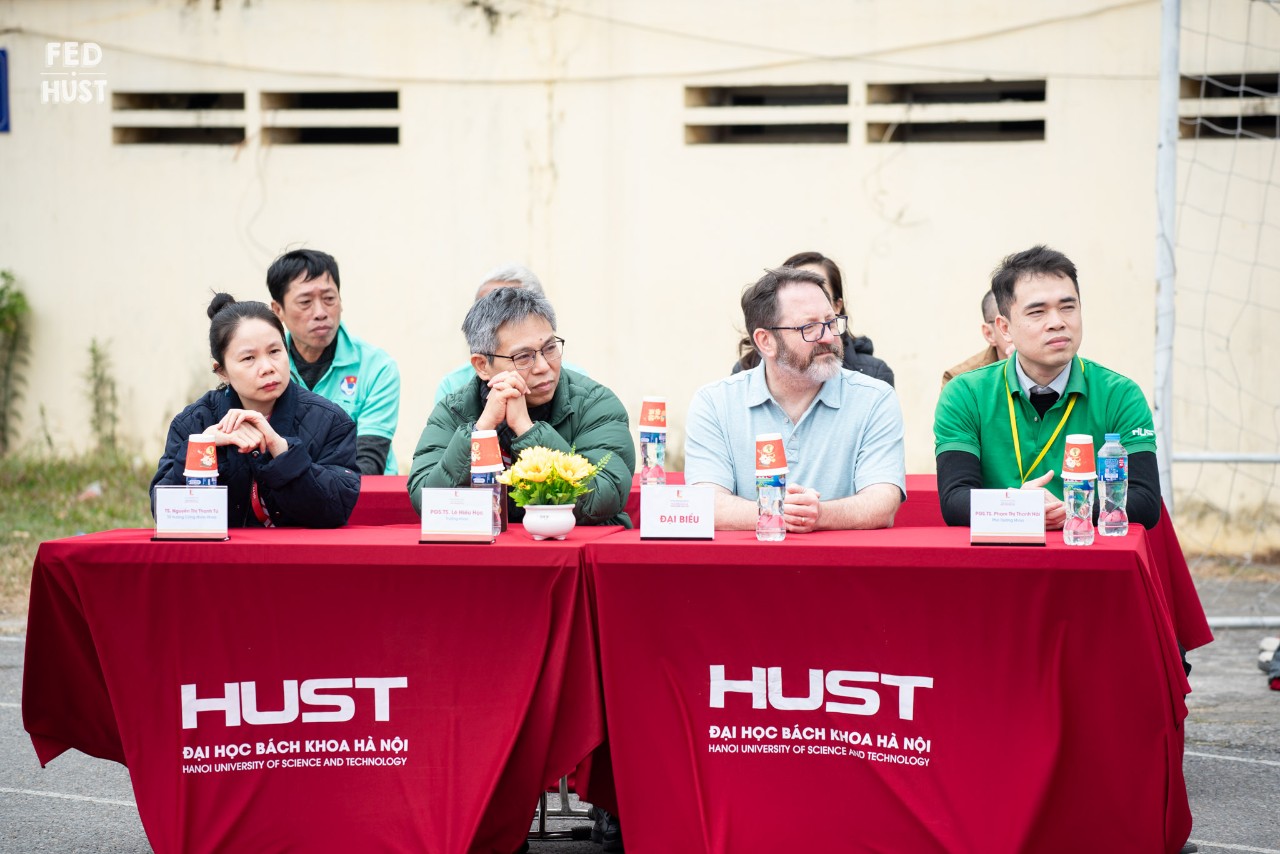 group of professors siting at a table answering questions
