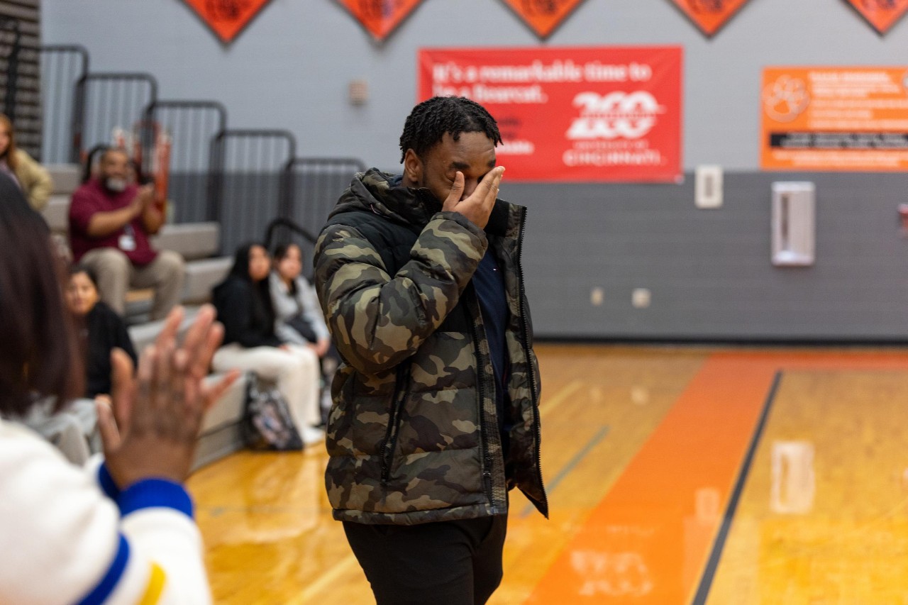 UC celebrates Decision Day 2025 student surprises. Withrow High School, Oliver Tiani Vessah and Harsh Minhas (Marian Spencer Scholars).