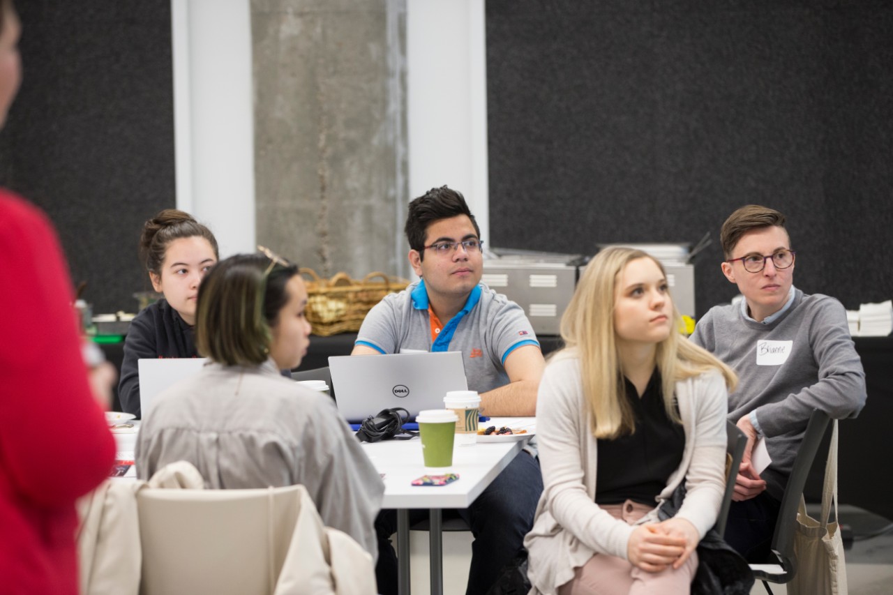 Students listen to a presentation at 1819. Photo/Joseph Fuqua II