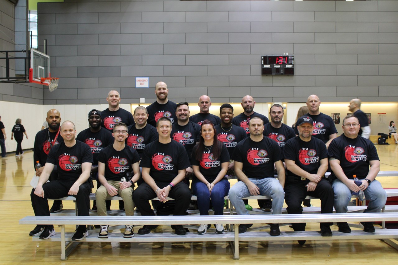 A group photo of the coaches for the UCPD 3v3 Scholarship Basketball Tournament.