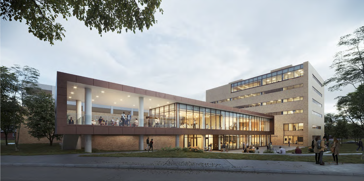 Front of the UC College of Law building at dusk
