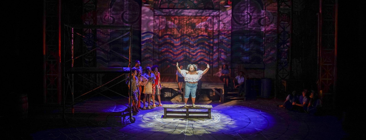 Erin Morton performs on stage in "Once on This Island" at CCM.
