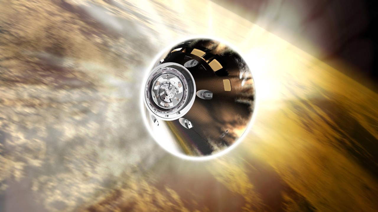 An illustration of the Orion capsule re-entering the atmosphere shows fire radiating off the heat shield.