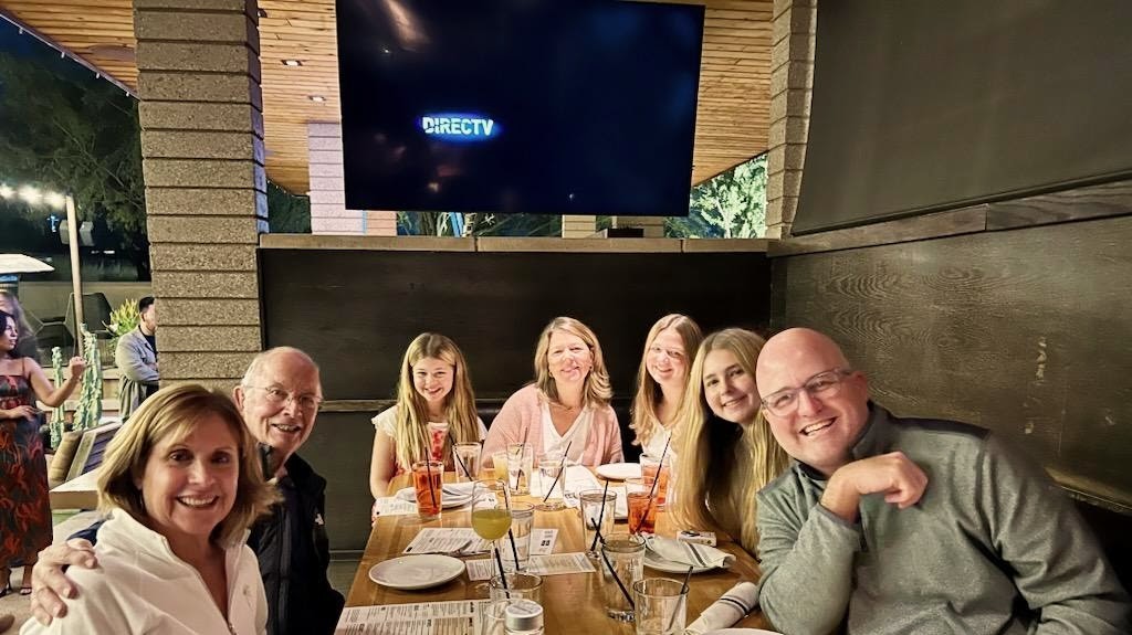 Pringle family at a table.