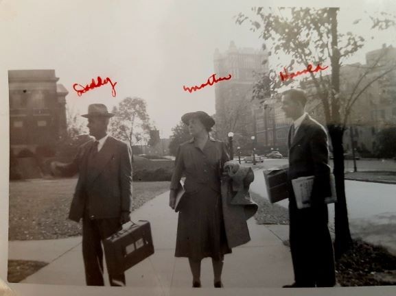 Harold Sullivan with parents. Black and white photo.