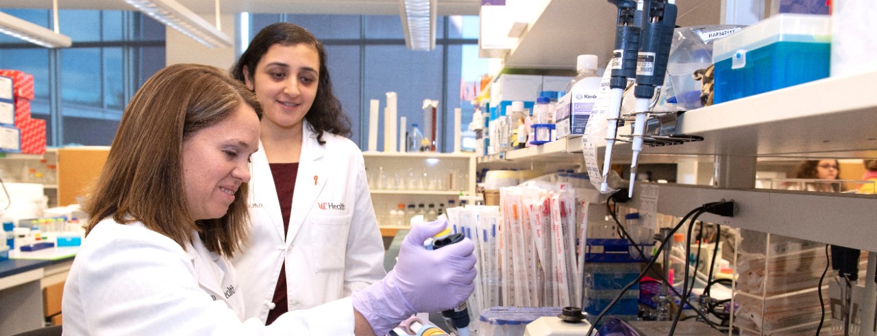 Trisha Wise Draper with Vinita Takiar in a lab