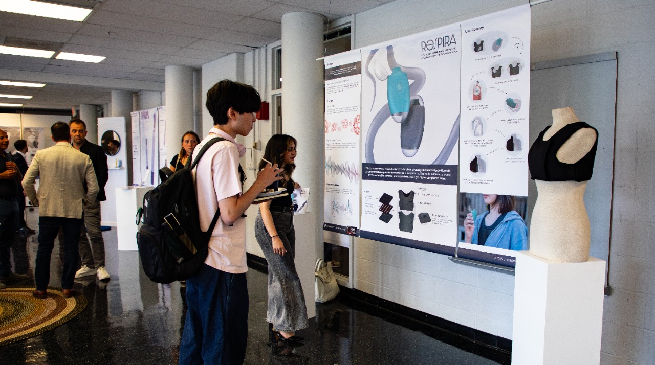 Respira project booth with Hyder in the background