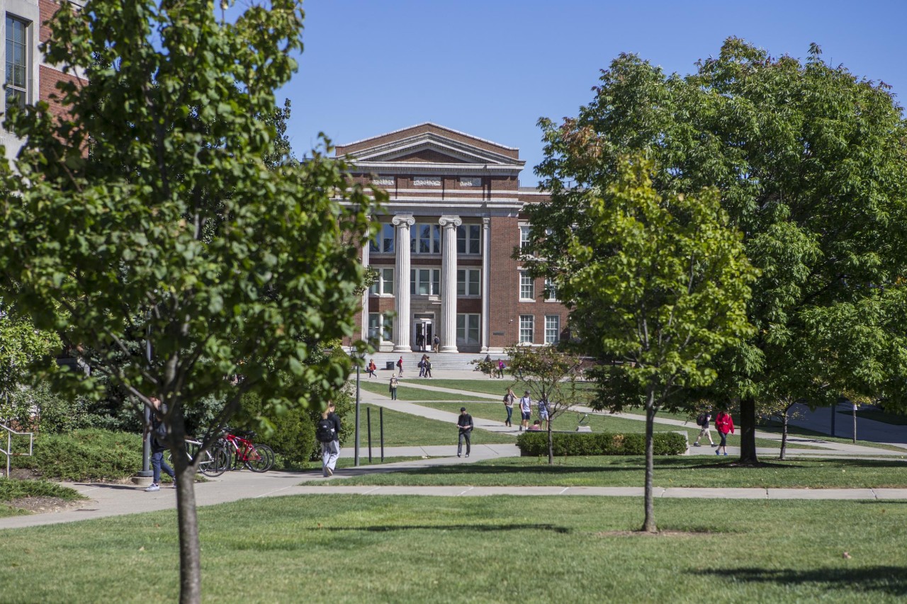 University of Cincinnati&#39;s Baldwin Hall through the trees 