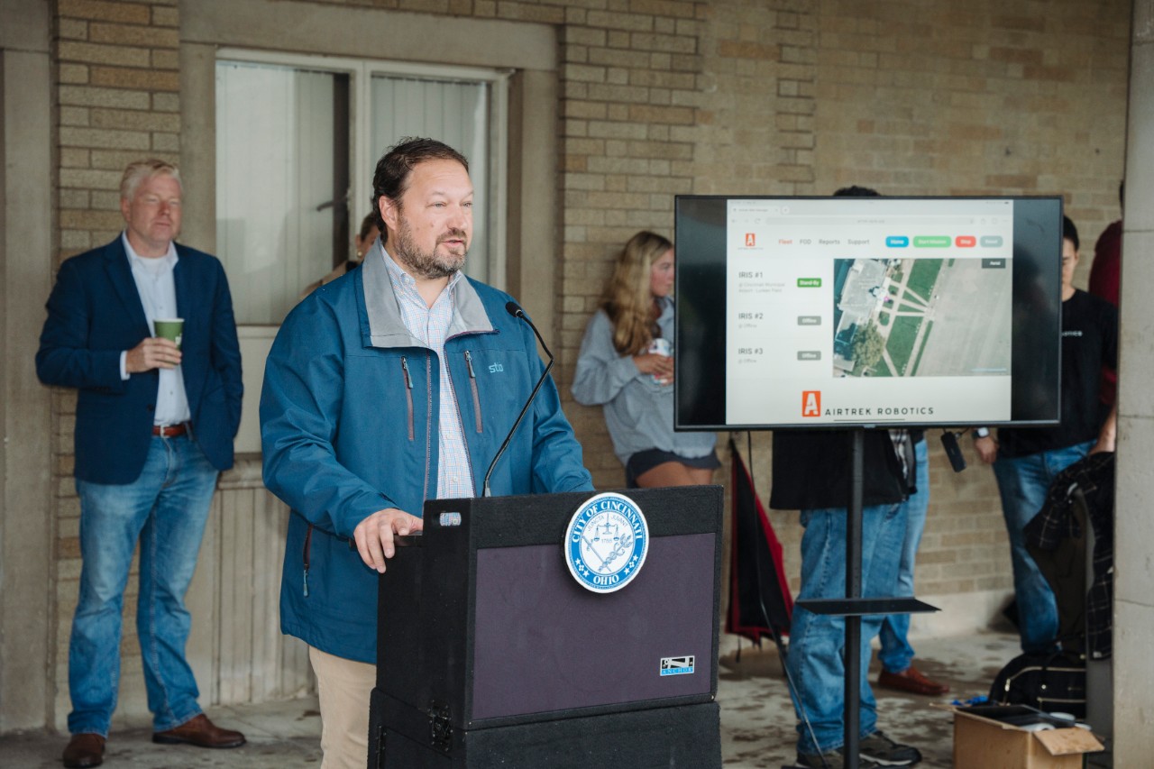 CEO of Cintrifuse, J.B. Kropp stands at poduim.