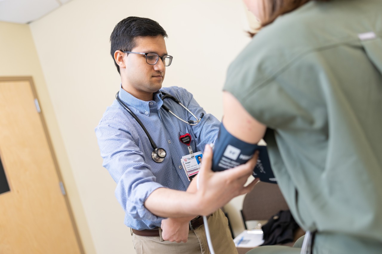 Faculty and students volunteer at a free clinic at the Healing Center.