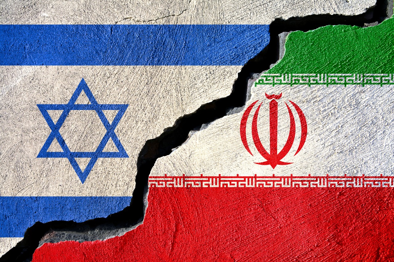illustration showing flags of israel and iran torn
