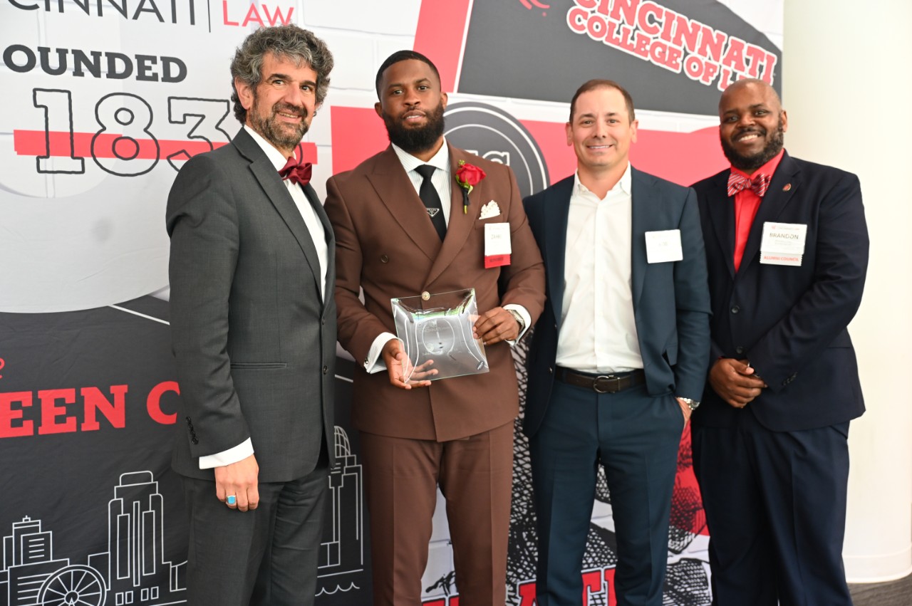 Dean Haider Hamoudi, Zahki Davis, Rob McDonald, and Brandon Craig (Board President)