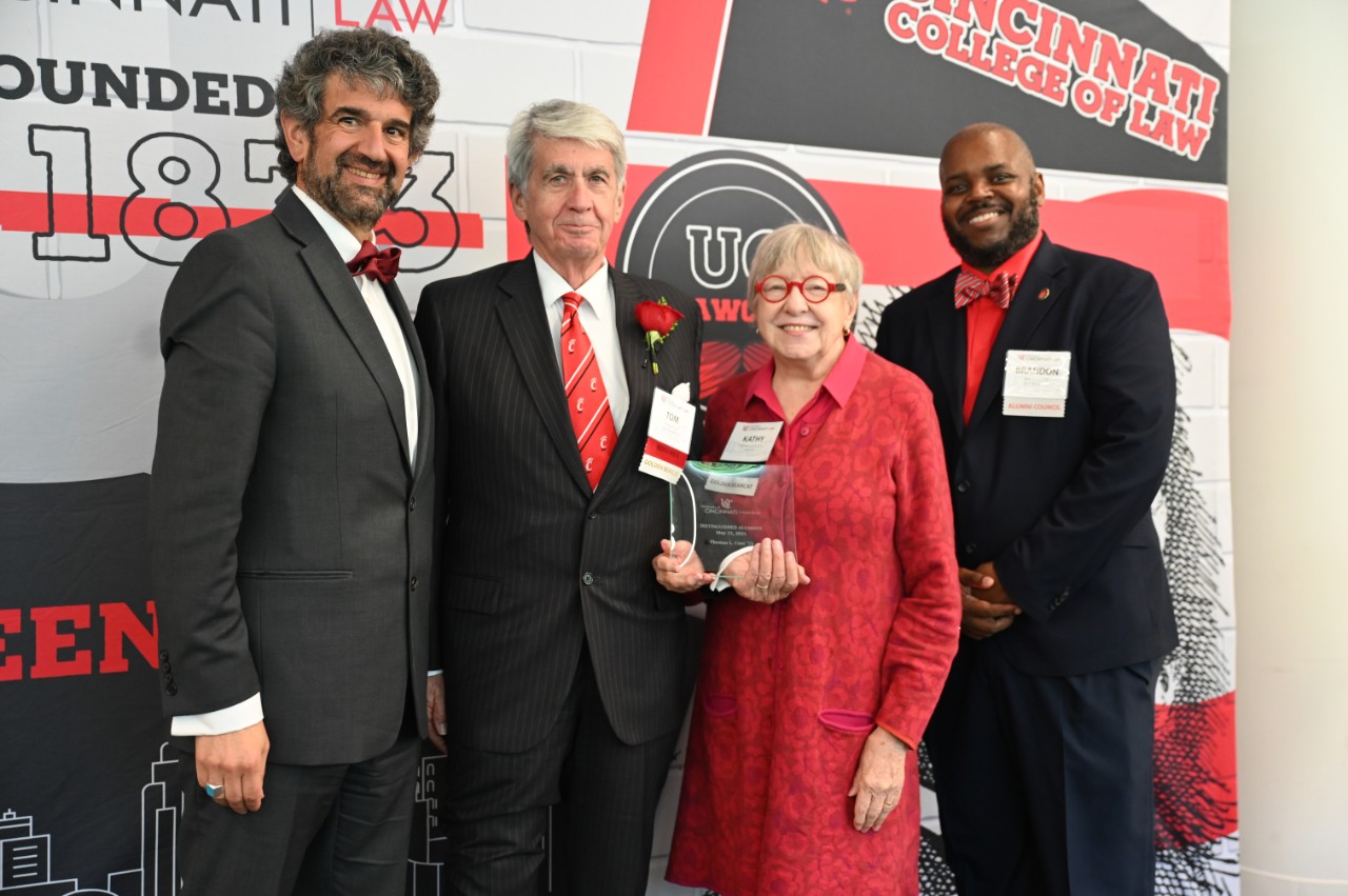 Dean Haider Hamoudi, Tom Cuni (Distinguished Alum), Kathy Brinkman, and Brandon Craig (Board President)