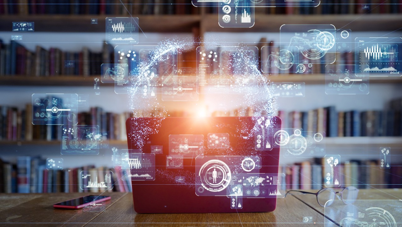 book shelves with AI imagery on a computer