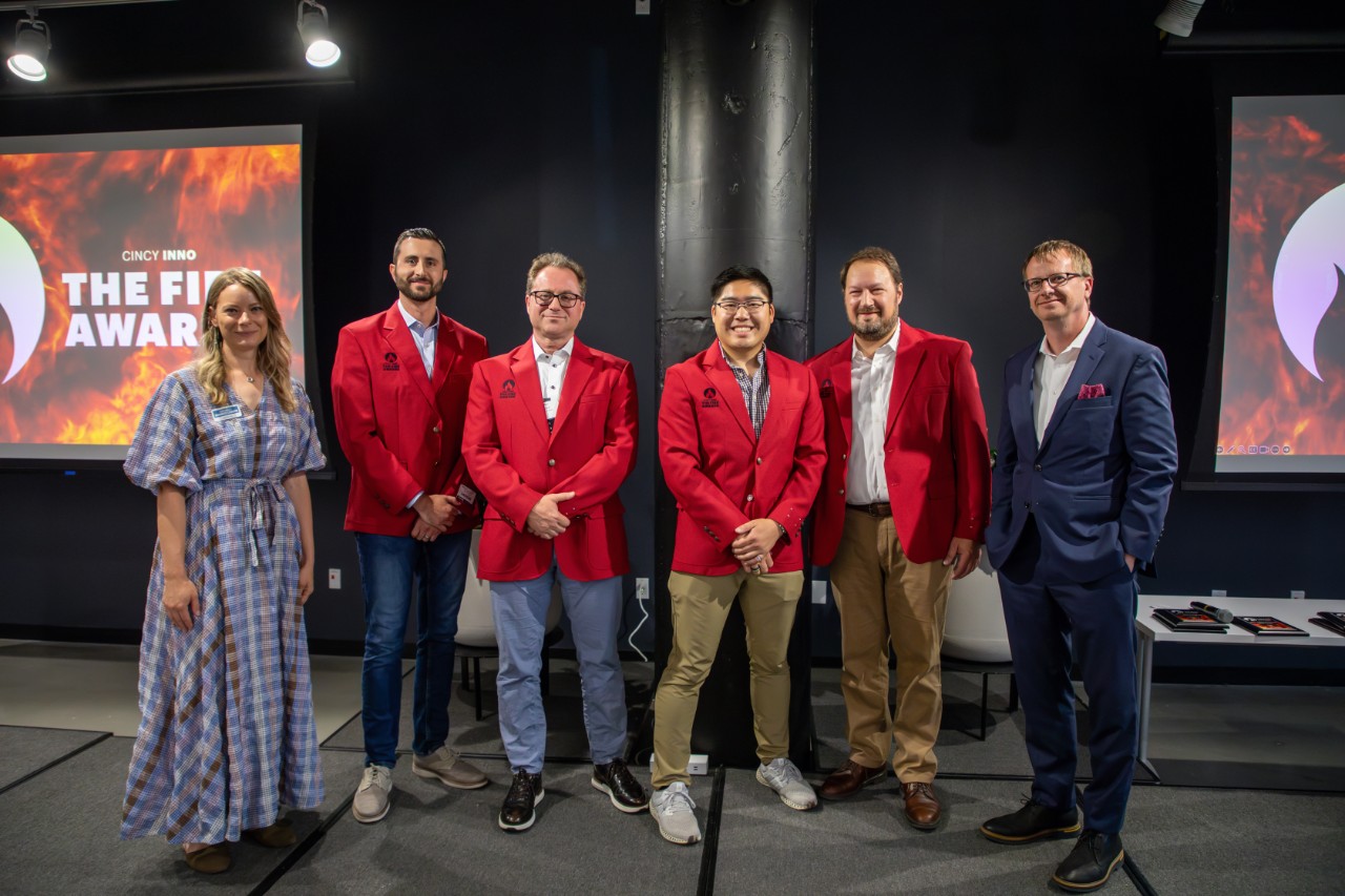 Ryan Hays stands with winners of Fire Awards.