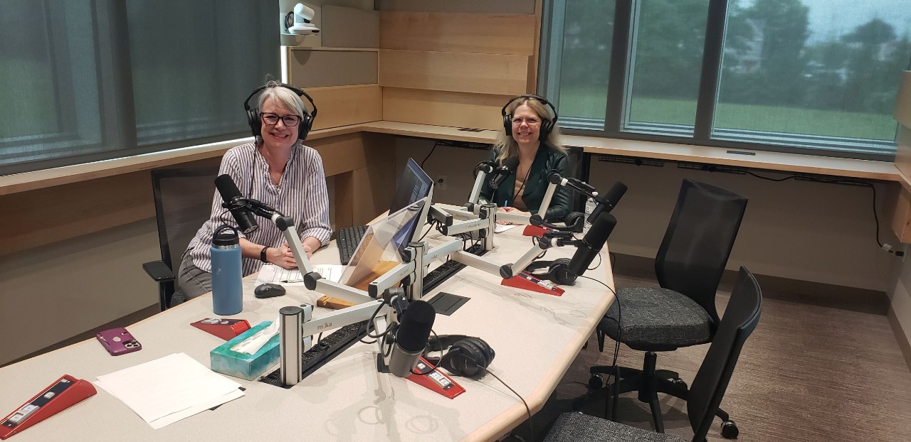 Cincinnati Edition's Lucy May shown with UC Law's Anne Lofaso in the radio studio
