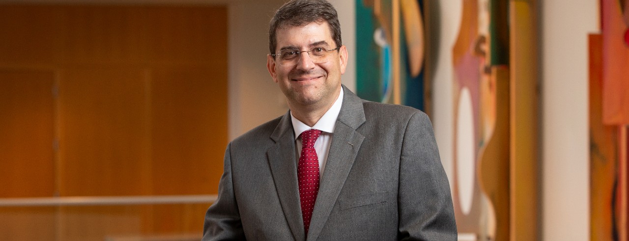 A portrait of CCM Dean Pete Jutras in the CCM Atrium. 