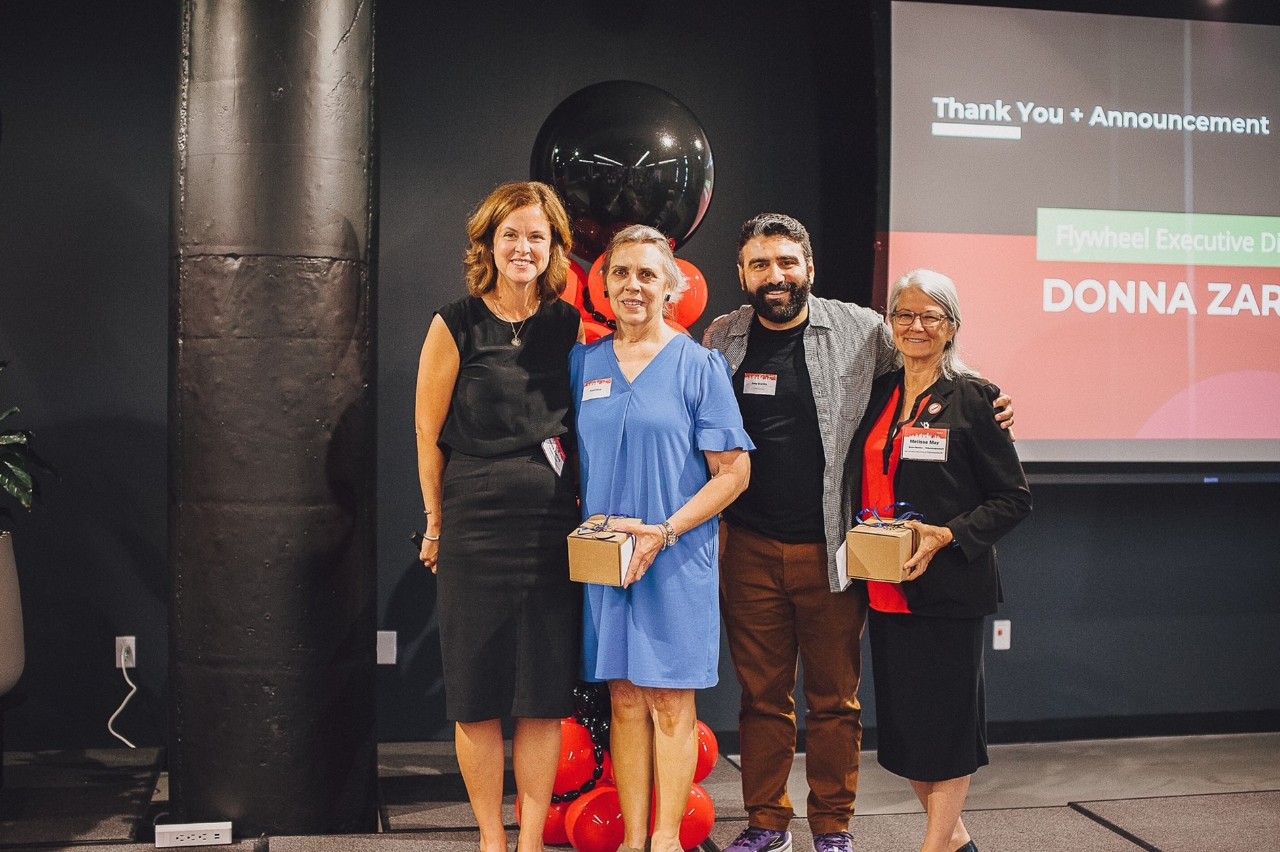 The Flywheel team posing at 1819