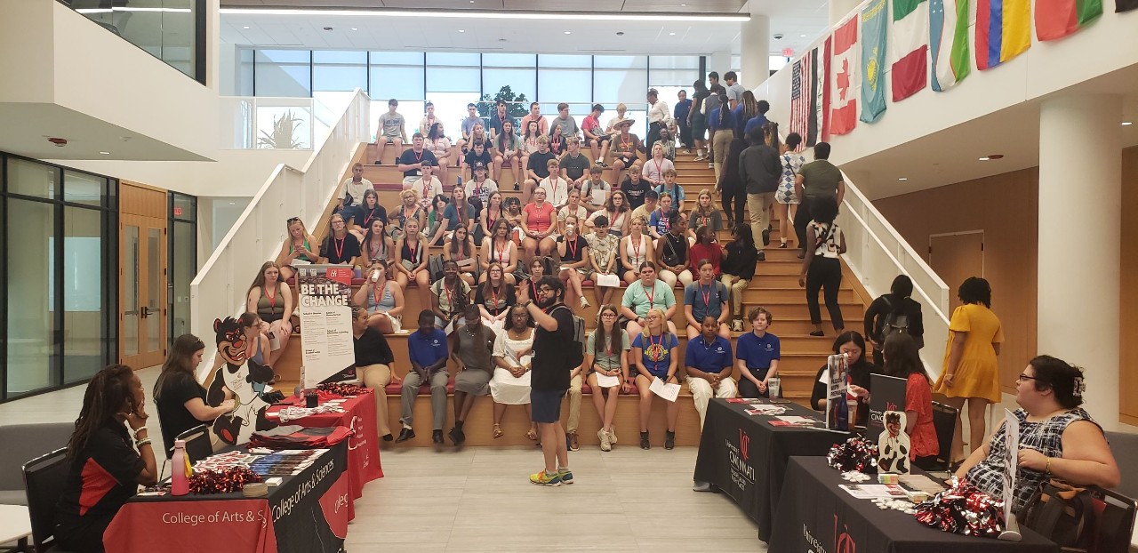 70 high school student seating on risers in the UC College of Law