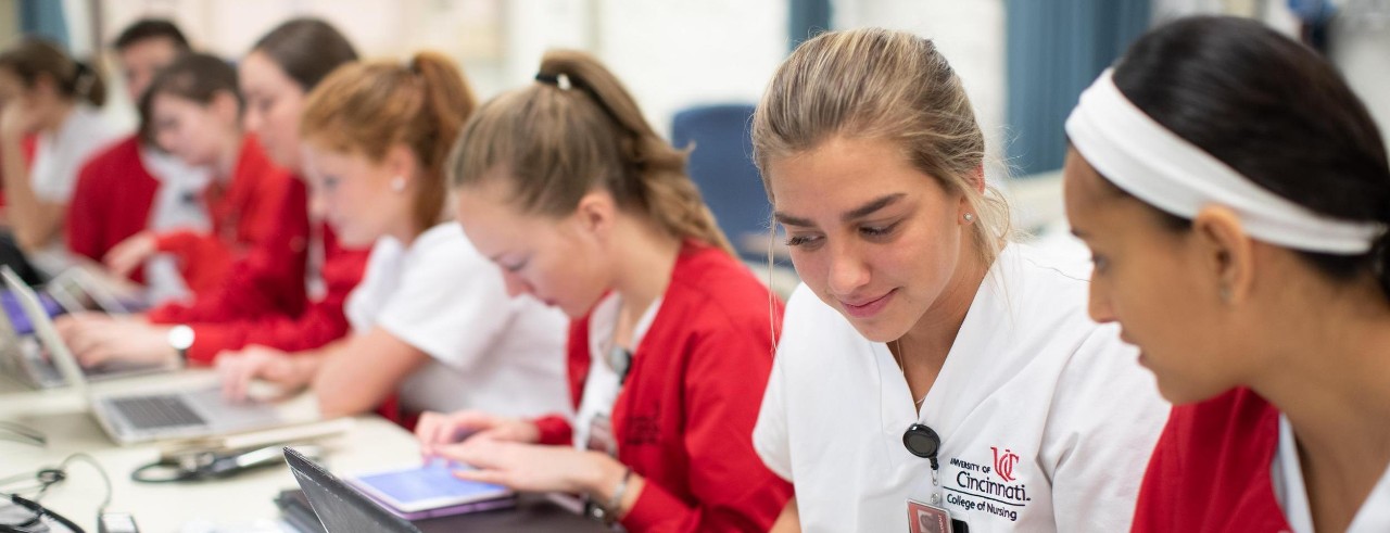 nursing students wearing red and white