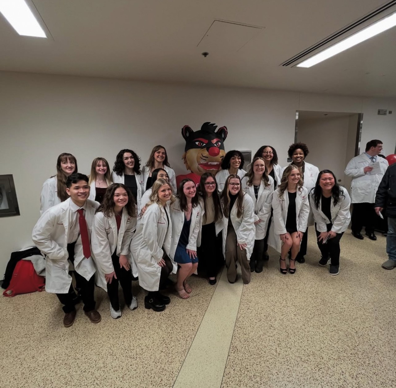 Medical Laboratory Science students pose with lab coats